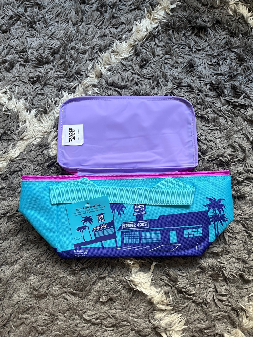 Trader Joe’s mini insulated bag. New with tag. Blue. Purple.